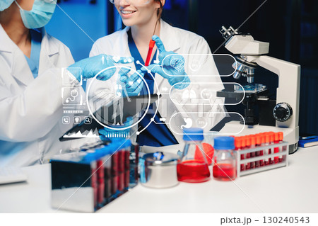 Dctor work on digital tablet healthcare doctor technology tablet using computer in laboratory study with virtual icon 130240543