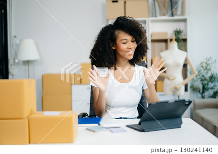 Small business entrepreneur SME freelance woman working at home office, BOX,tablet and laptop online, marketing, packaging Small business entrepreneur SME freelance woman working at home office, BOX,tablet and laptop online, marketing, packaging 130241140