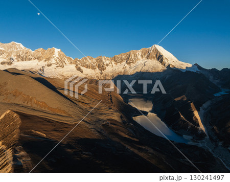 Aerial view of beautiful snow capped mountain and lake sunrise landscape in Tibet, China 130241497