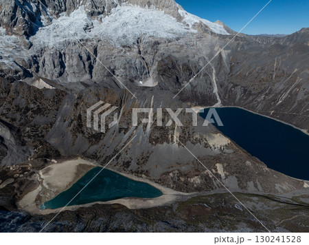 Aerial view of beautiful snow capped mountain and lake landscape in Tibet, China Aerial view of beautiful snow capped mountain and lake landscape in Tibet, China 130241528