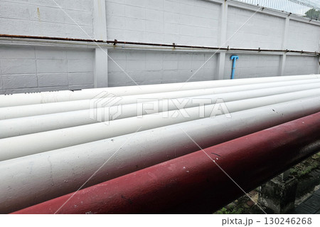 Industrial Pipes and Wall Background. Industrial Pipes and Wall Background. 130246268