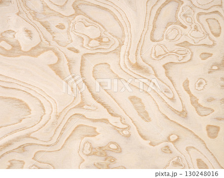 Sculptural birch veneer surface painted with soft cream and pale gold swirls 130248016