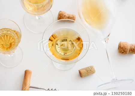 Set of glasses of yellow wine at wine tasting Set of glasses of yellow wine at wine tasting 130250180