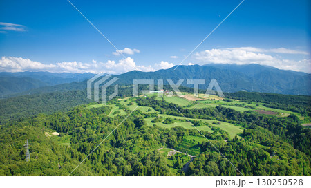 日本の富山県東部の黒部市の丘陵部から見える牧場やため池や富山湾や水田の様子 130250528