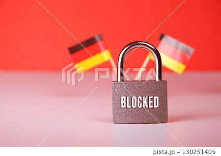 Closed padlock with the inscription lock on background of the flag of Germany. Closed padlock with the inscription lock on background of the flag of Germany. 130251405