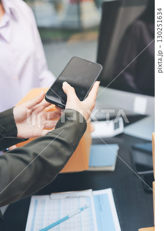 Portrait of Starting small businesses SME owners, two Asian woman check online orders Selling products working with boxs freelance work at home office, sme business online small medium enterprise 130251634