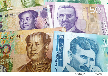 Stack of Chinese Remninbi and Serbian Dinar 130252892