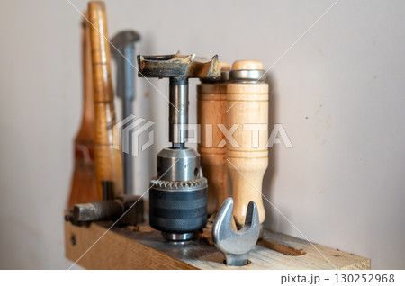 A set of carpentry tools in a workshop, ready for a DIY project. 130252968
