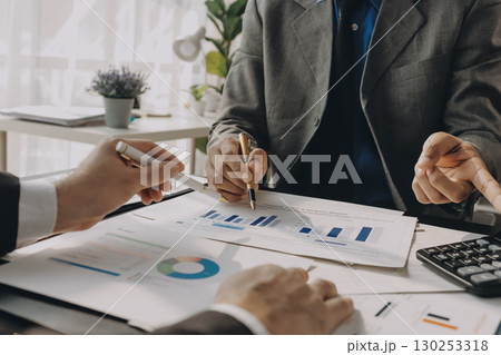 Accounting company provide finance and taxation planning for profitable cash flow, Auditor and accountant team working in office, analyze financial data and accounting record with calculator.Insight Accounting company provide finance and taxation planning for profitable cash flow, Auditor and accountant team working in office, analyze financial data and accounting record with calculator.Insight 130253318