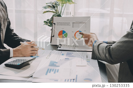 Accounting company provide finance and taxation planning for profitable cash flow, Auditor and accountant team working in office, analyze financial data and accounting record with calculator.Insight Accounting company provide finance and taxation planning for profitable cash flow, Auditor and accountant team working in office, analyze financial data and accounting record with calculator.Insight 130253335