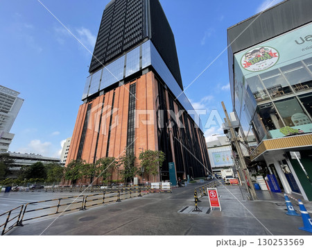 Bangkok, Thailand - Feb 12, 2023 : Empty street in the morning of Siam Square in Bangkok, Thailand on Feb 12, 2023. Siam Square is a shopping and entertainment area in Bangkok. Bangkok, Thailand - Feb 12, 2023 : Empty street in the morning of Siam Square in Bangkok, Thailand on Feb 12, 2023. Siam Square is a shopping and entertainment area in Bangkok. 130253569