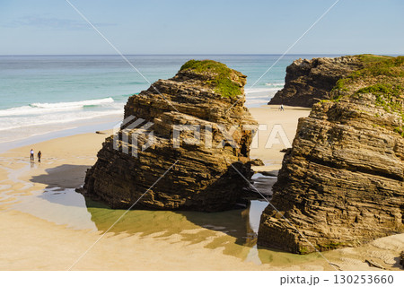 People walking on Cathedrals Beach, Galicia Spain. People walking on Cathedrals Beach, Galicia Spain. 130253660