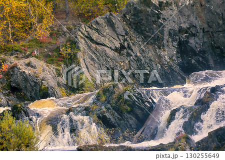 Autumn, yellow leaves, waterfall Autumn, yellow leaves, waterfall 130255649