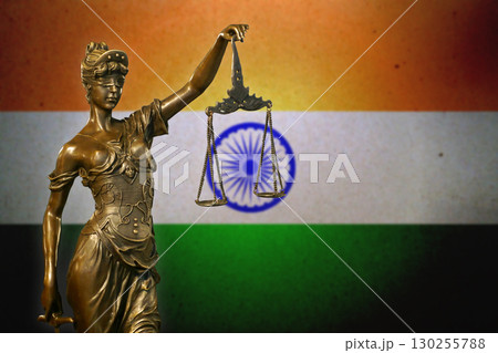 Lady Justice before a flag of India Lady Justice before a flag of India 130255788