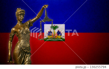 Lady Justice before a flag of Haiti 130255794