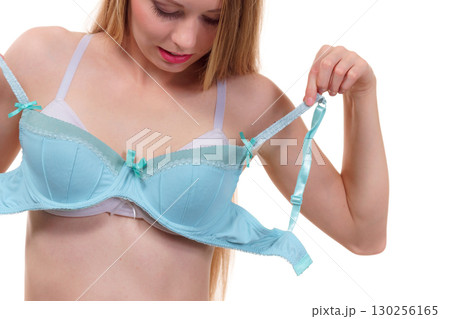 Woman choosing underwired bra 130256165