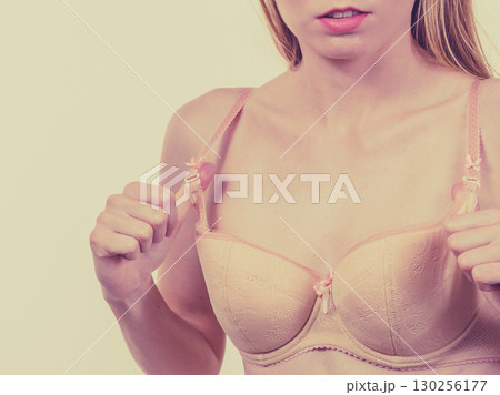 Woman wearing wrong size bra Woman wearing wrong size bra 130256177