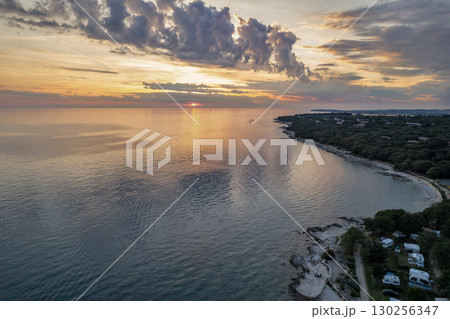 Sunset clouds over the Adriatic coast. Istria, Croatia. 130256347