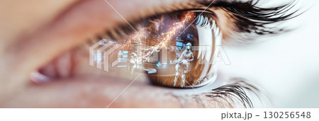 Closeup human eye reflecting robotic production with advanced technology concept 130256548