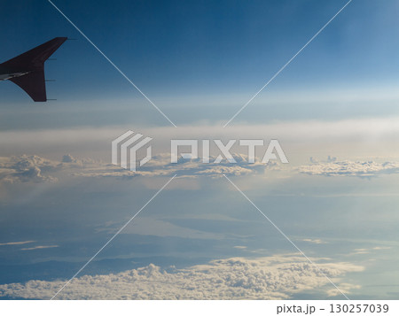 Beautiful white clouds and blue sky from plane 130257039