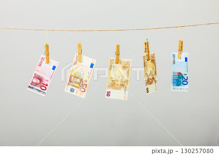 Banknotes on laundry line 130257080