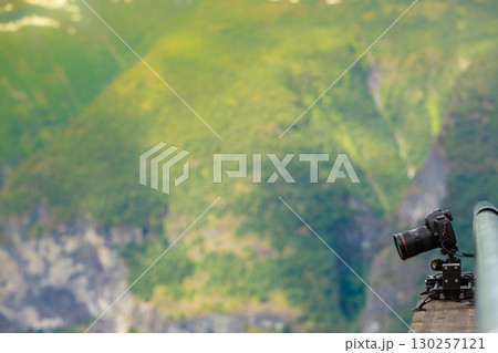 Camera in mountains, photography in wildlife Camera in mountains, photography in wildlife 130257121