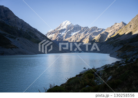 Beautiful alpine landscape with glacial lake, glaciers and snowy mountain, Mt Cook, New Zealand 130258556