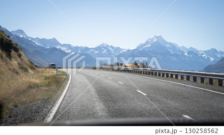 View from a dashboard driving on a alpine road with mountains in backdrop, Mt Cook, New Zealand 130258562