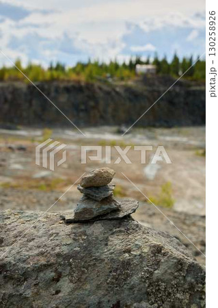 The beauty of stacked stones found in nature creates a sense of tranquility and serenity 130258926