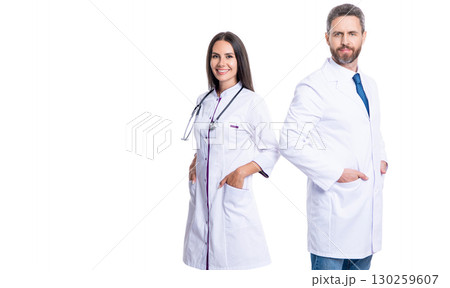 doctor at hospital. two doctor in medical practice. doctor with stethoscope isolated on white. professional physician in white coat with medical woman. medicine and healthcare. advertisement doctor at hospital. two doctor in medical practice. doctor with stethoscope isolated on white. professional physician in white coat with medical woman. medicine and healthcare. advertisement 130259607