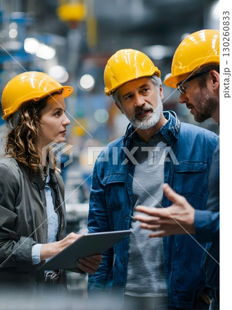 female team leader discussing supply solutions with engineers high detail 8k female team leader discussing supply solutions with engineers high detail 8k 130260833