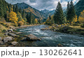 A Majestic Winding River Flows Through a Lush Forest, Capturing the Essence of Natural Beauty Ideal for HighEnergy and RelaxationFocused Projects. 130262641