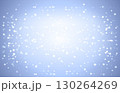 A lovely blue background features shimmering light particles and snowflakes, creating a festive atmosphere perfect for Christmas celebrations and holiday-themed designs 130264269