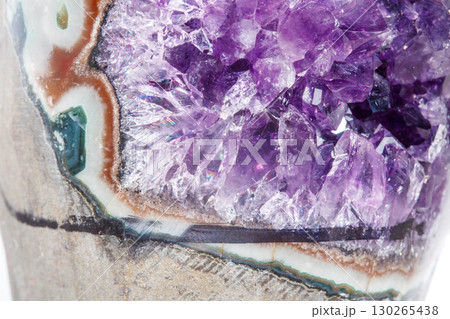 Amethyst Crystal Druse macro mineral on white background Amethyst Crystal Druse macro mineral on white background 130265438