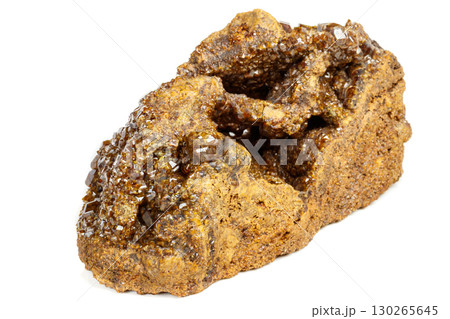 Macro mineral stone Garnet, Green Garnet, Epidote Grossular in the rock on a white background 130265645