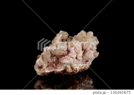 Macro mineral stone Pink Amethyst on a black background 130265675