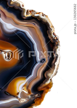 Macro mineral stone Yellow, brown Agate breed a white background 130265682