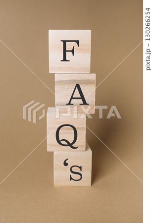 Stack of wooden blocks with the letters F, A, Q, and S on top Stack of wooden blocks with the letters F, A, Q, and S on top 130266254
