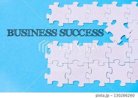 Jigsaw puzzle with the words "Business Success" written on it 130266260
