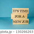 Wooden block with the words "It's time for a new job" written on it 130266263