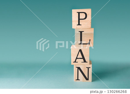 Stack of wooden blocks with the word Plan written on them Stack of wooden blocks with the word Plan written on them 130266268