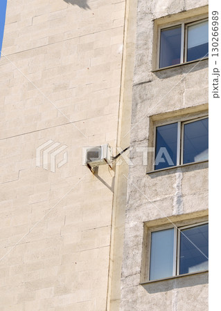 air conditioner is mounted on wall. technologies for air cooling in hot weather. air temperature air conditioner is mounted on wall. technologies for air cooling in hot weather. air temperature 130266989