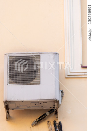 air conditioner is mounted on wall. technologies for air cooling in hot weather. air temperature 130266991