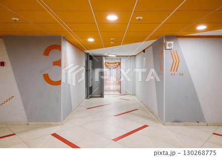 The modern corridor design features intricate geometric patterns and a variety of vibrant colors The modern corridor design features intricate geometric patterns and a variety of vibrant colors 130268775