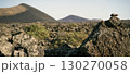 Landsape with volcanoes, mountains and volcanic rocky terrain. 130270058