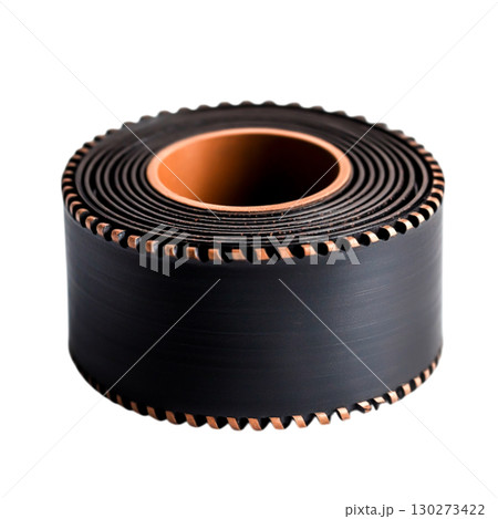 Vintage Film Reel with Black Tape and Brown Core on White Background for Cinematic Nostalgia 130273422
