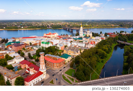 Aerial view of Rybinsk cityscape with bridge across Volga and Cathedral 130274003
