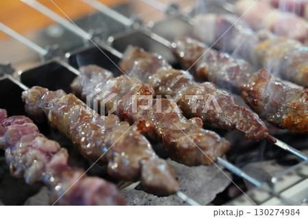 Grilled Lamb Skewers on a Charcoal Grill 130274984