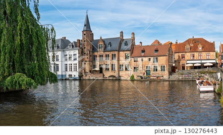 Picturesque Canals of Brugge, Belgium A Charming Waterside View in Historic Bruges Cityscape 130276443