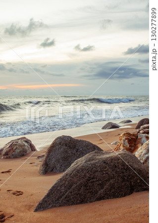 The seashore in Thailand. Khao Lak Island. The sea with rocks in the foreground The seashore in Thailand. Khao Lak Island. The sea with rocks in the foreground 130277899